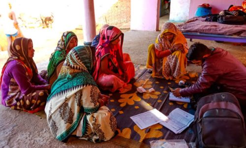DISTRICT KATNI, INDIA - JANUARY 16, 2020: Indian village women crowd for Micro finance loan repayment, small group meeting program.
